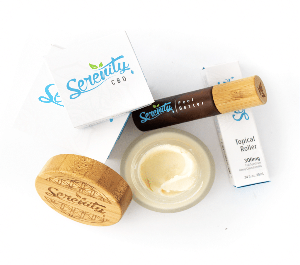 Serenity CBD products, Long Lasting Topical Balm and CBD Roller Ball on a white background, both which contain arnica.